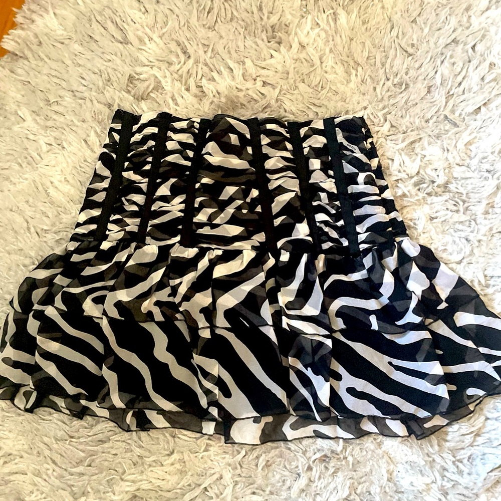 Bebe black and white skirt size 4. Brand new with tags.